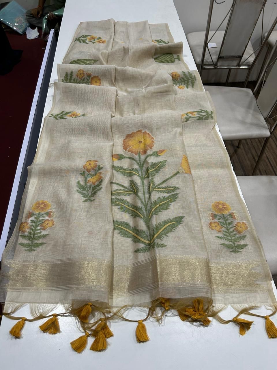 Beige Linen Saree with Yellow Floral Motifs & Yellow Tassels