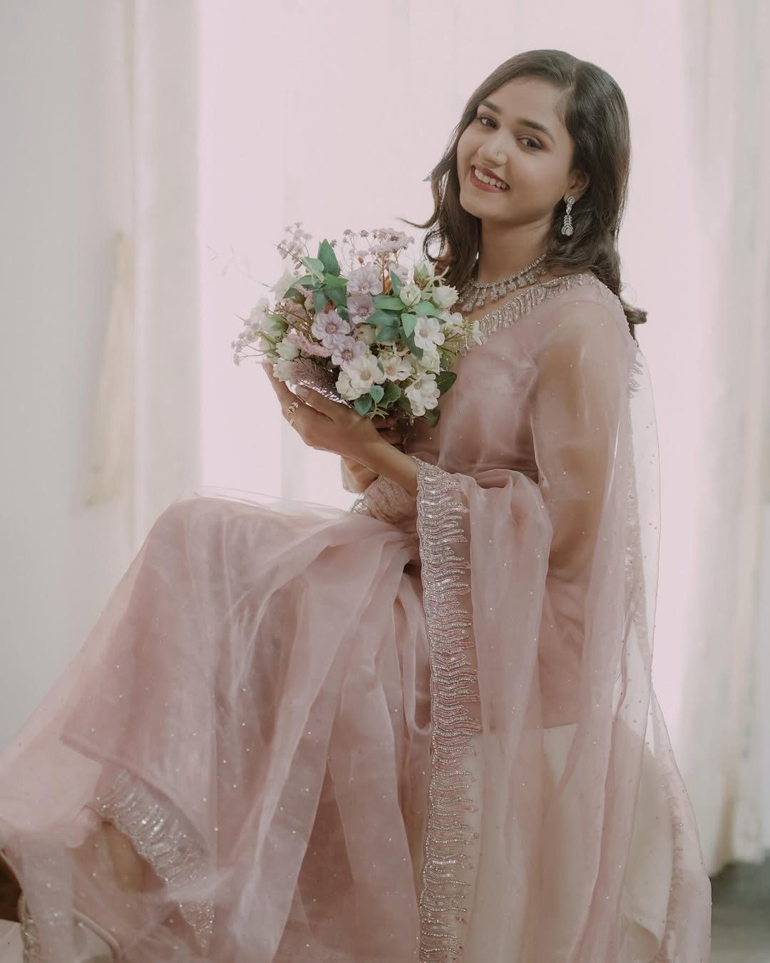 Elegant Baby Pink Organza Saree with Silver Sequin Embellishments