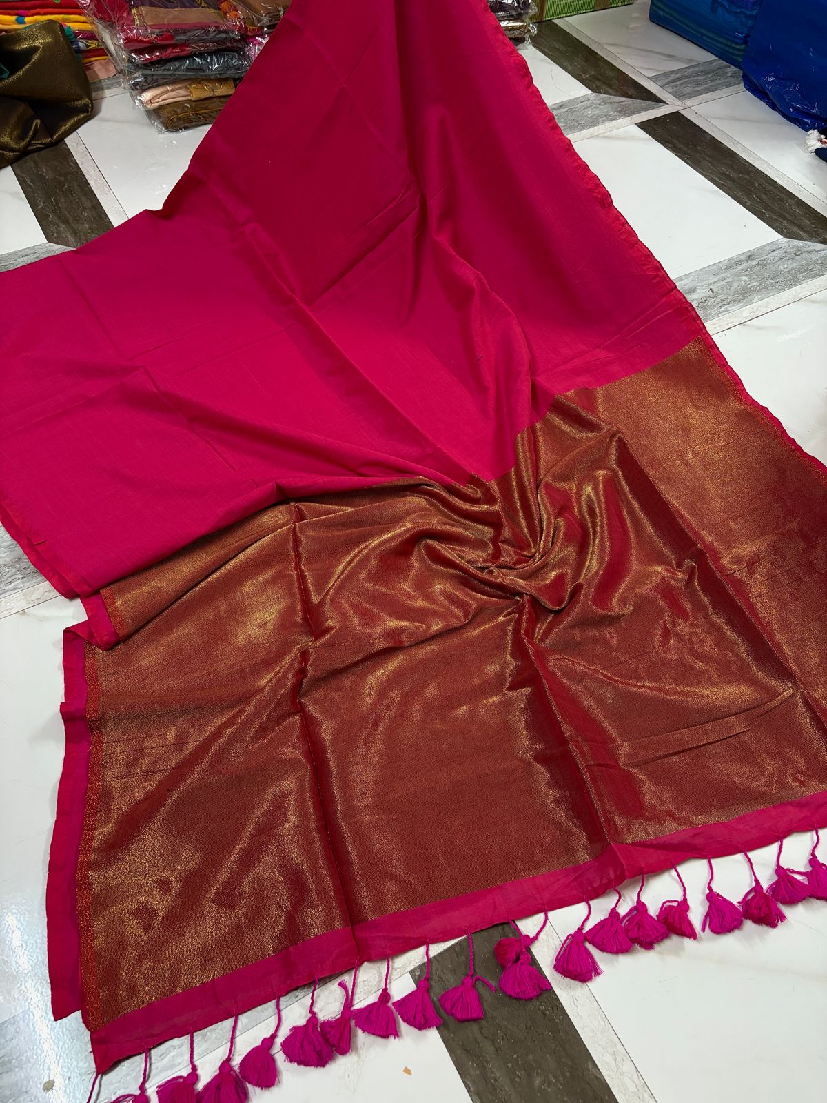 Vibrant Pink Saree with Golden Border and Tassels